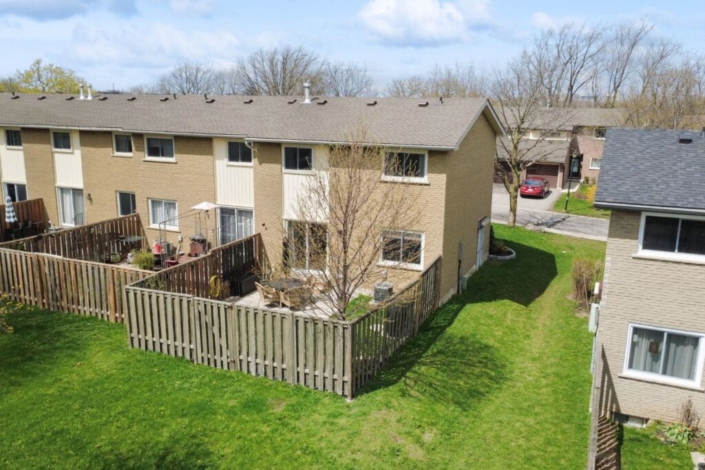 Hamilton townhouse for sale aerial view showing end unit position and fenced backyard