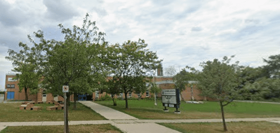 Exterior view of Homelands Senior Public School building and surrounding greenery in Mississauga.